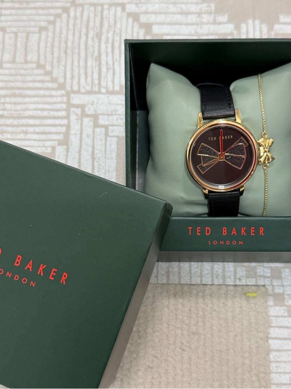 Ted Baker Black Strap Watch with Gold-Tone Case and Brown Dial